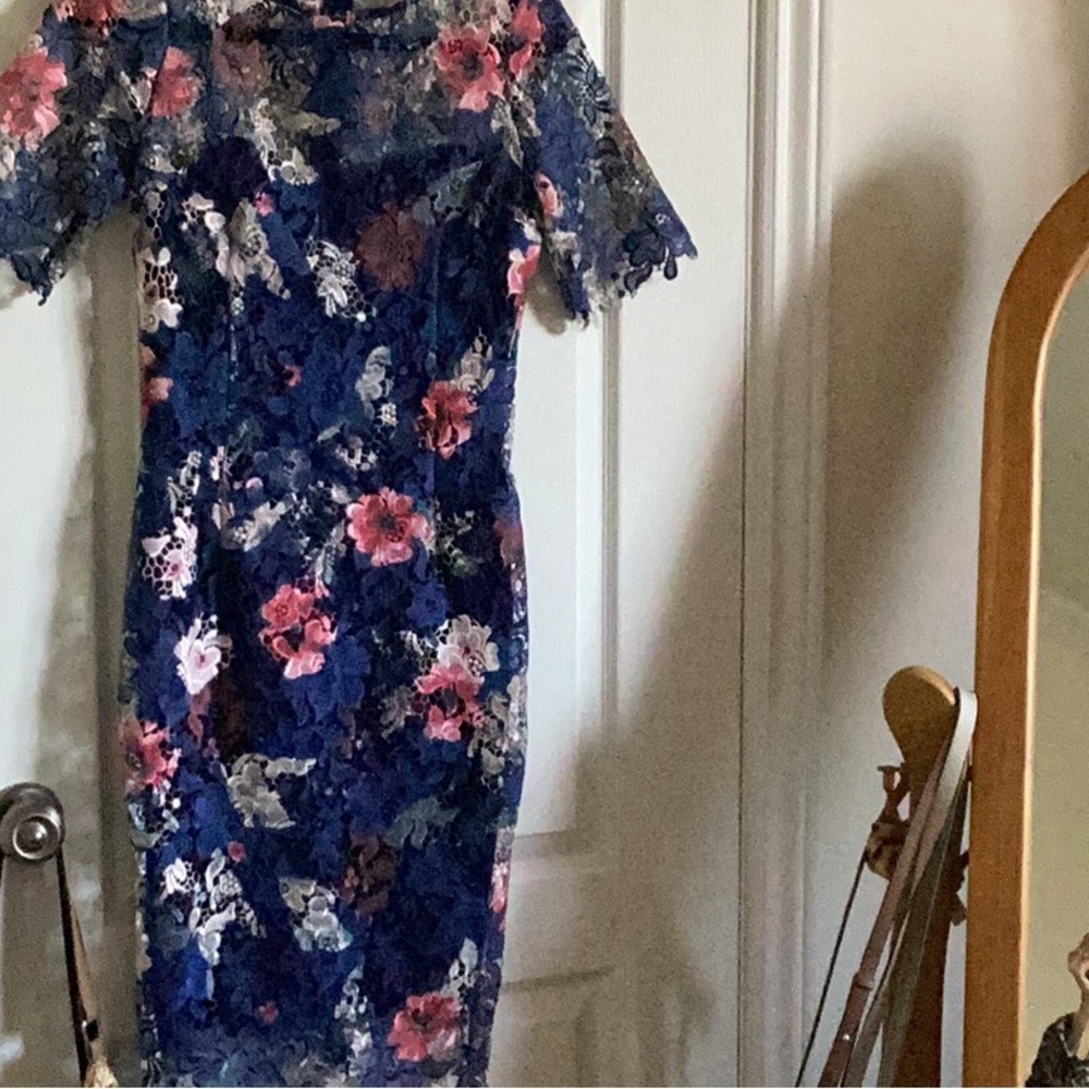 Beautiful navy lace dress with attached navy slip.